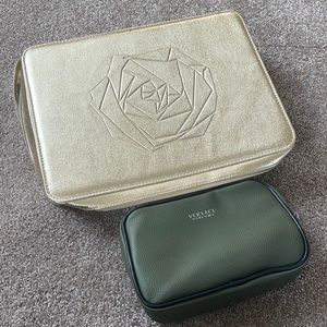 2 never used makeup/travel kits.very spacious. Never used. Zip closure.